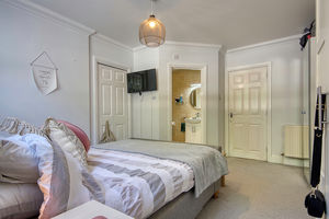 Bedroom One- click for photo gallery